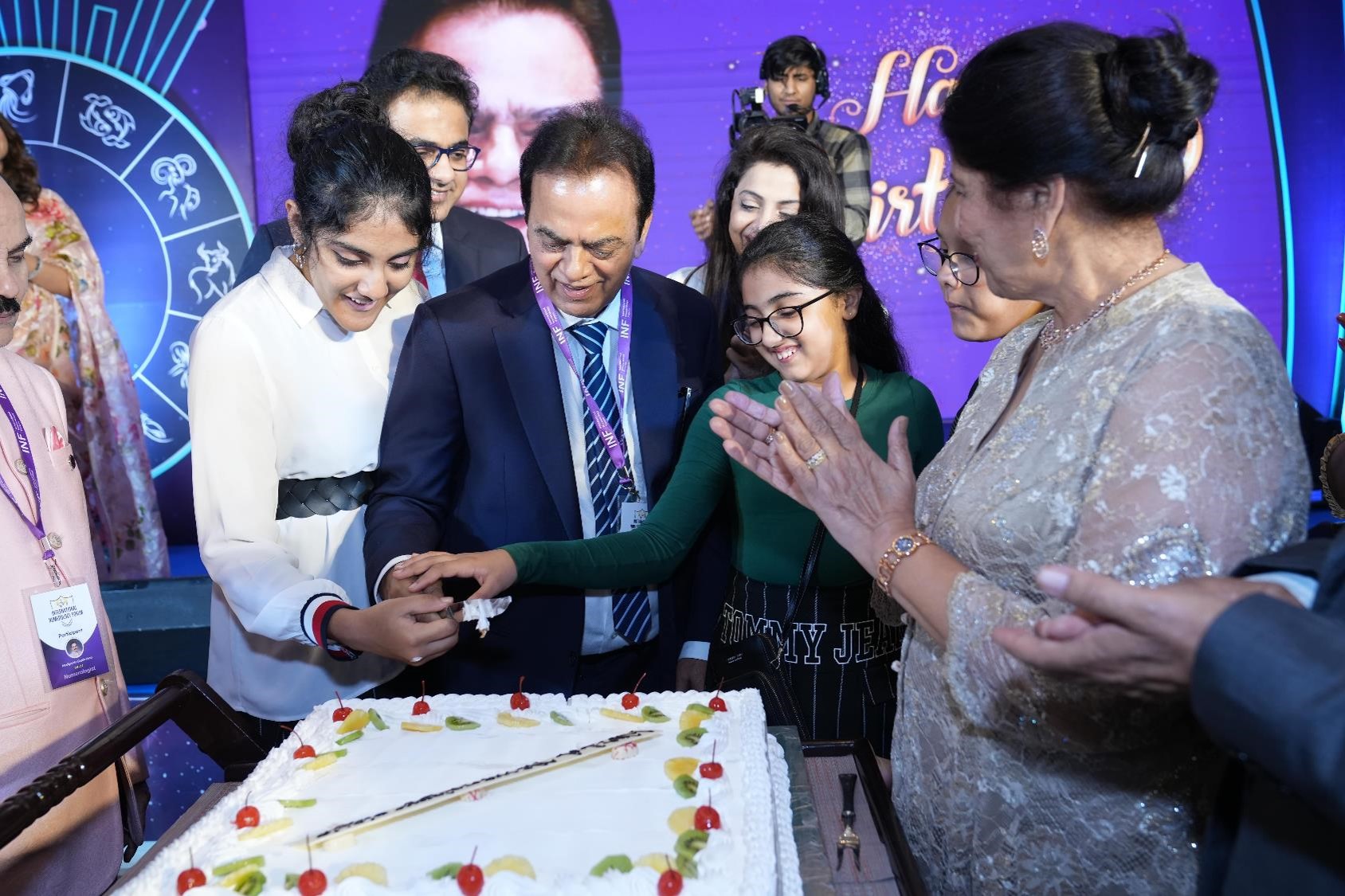 Cake cutting ceremony at INF conference