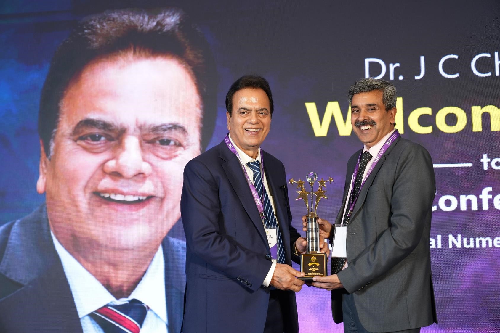 Dr. J C Chaudhry during the awards ceremony at INF conference
