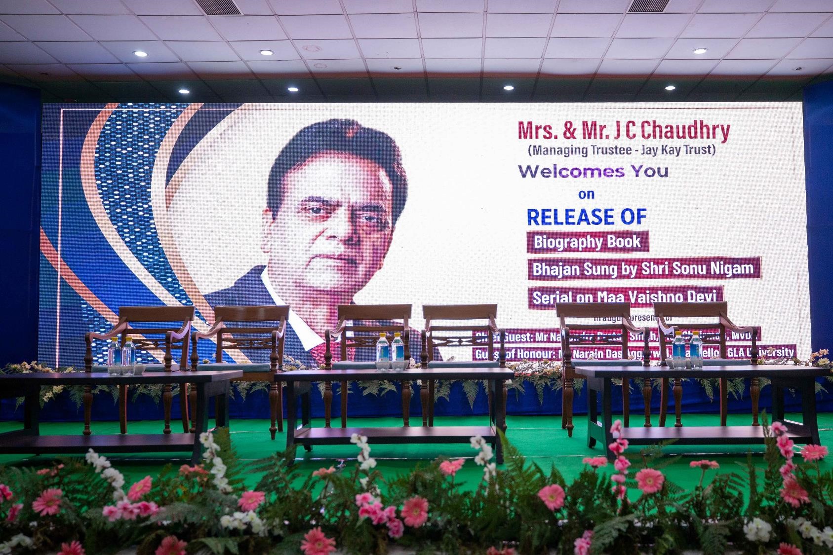 Mr J D Chaudhry holds biography book